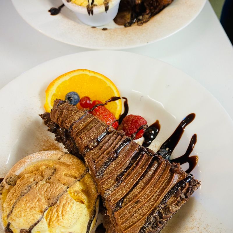 A chocolate dessert with orange