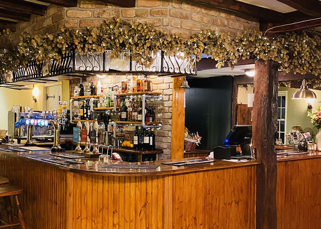 The bar, with garlands along the beams