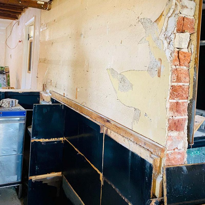 Walls stripped back to brick