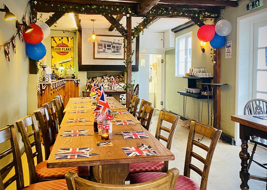 The restaurant, with tables laid for a celebration